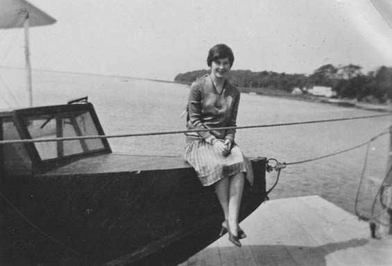 Woman Sitting on Bow of Unidentified Craft, Ca. 1928-30 (Source: Barnes) 
